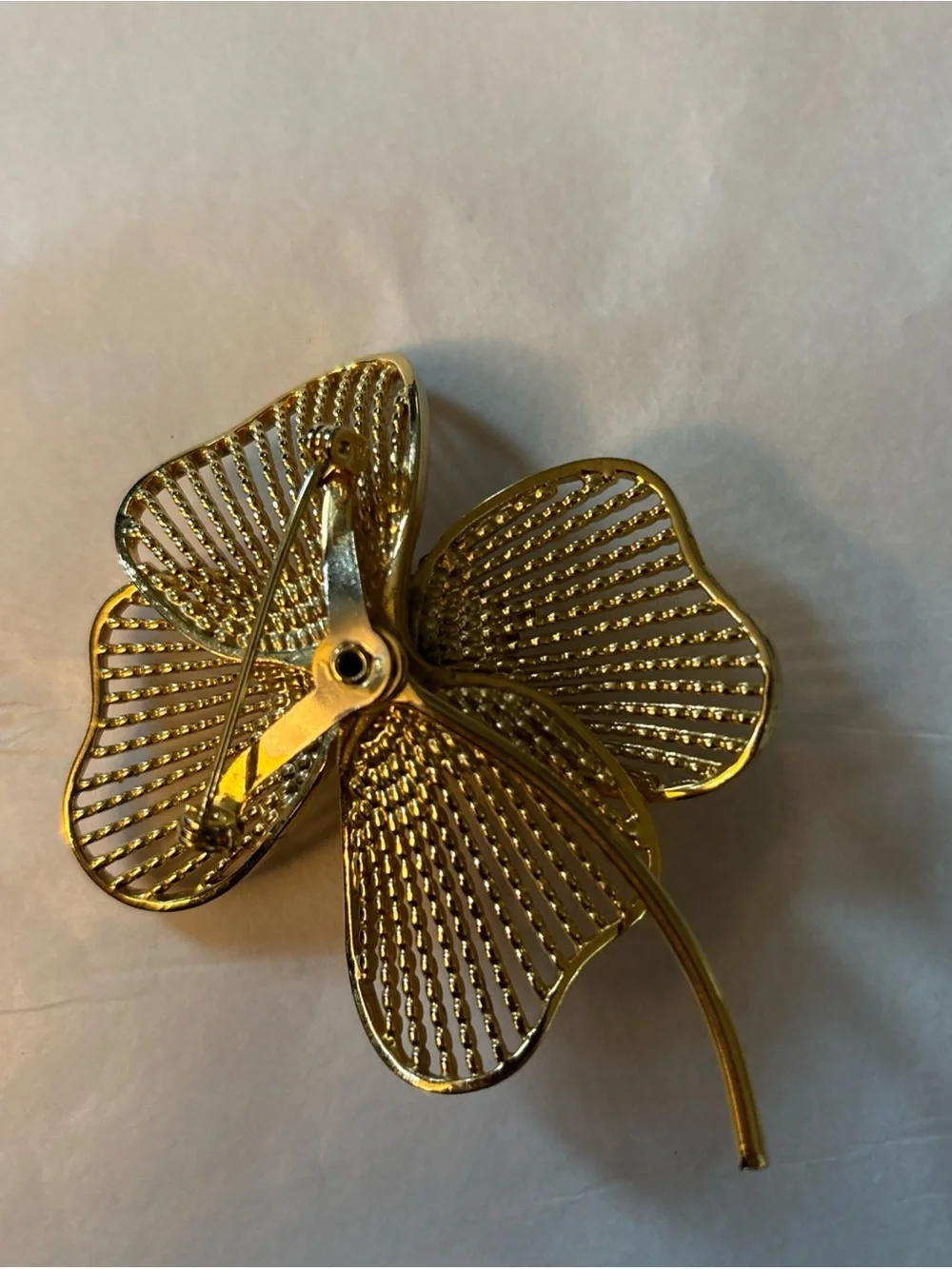 Gold Tone  4 Leaf Clover or flower brooch. Approximately 3 inches.